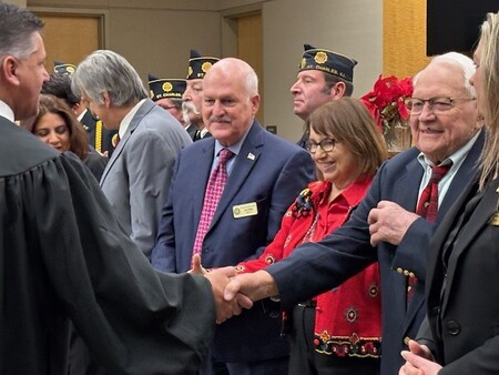 Kane County Board member join in a ceremonial event to take the Oath of Office