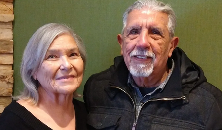 Mary and Rene Romero both work at the Kane County Clerk’s Satellite Office in downtown Aurora. (Tom Strong / For The Beacon-News) 