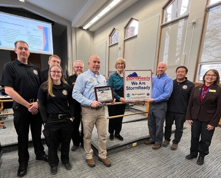 Members of the Kane County Office of Emergency Management, National Weather Service, Kane County Board Chairman Corinne Pierog, and County Board member Mavis Bates