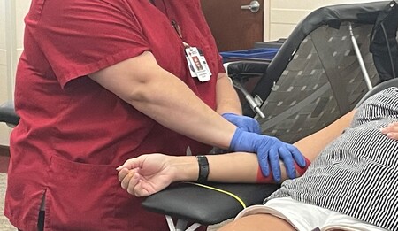 Individual Donating Blood at the Kane County Government Center 