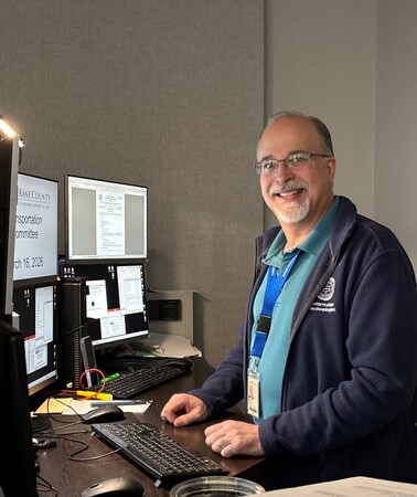 Blair Peters at the IT desk at Kane County