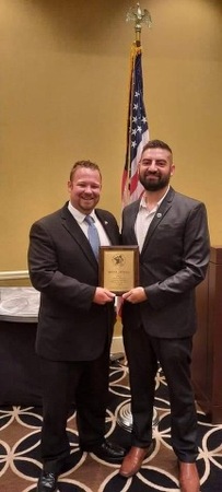 Kane County Veterans Assistance Commission Supt. Jake Zimmerman with Veterans Service Officer of the Year Jesus Arteaga