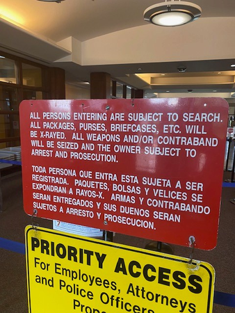 Courthouse screening sign.png