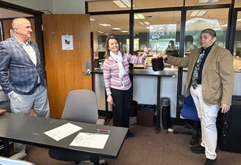 Chief Deputy. Clerk Celeste Weilandt (center) and Elections Dir. Raymond Esquivel (right) conduct public lottery at Clerk’s Office in Geneva. Democrat representative Ed Hanson (left) looks on.
