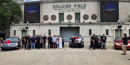 Picture of donated vehicles outside of Soldier Field 