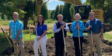 Officials from Kane County, the City of Batavia and the Batavia Park District celebrate a major realigment project at its groundbreaking this week. 