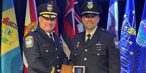 North Aurora Deputy Chief Joe Gorski (left) with Officer Chris Joswick after the award ceremony (credit North Aurora Police Dept. Facebook page) 