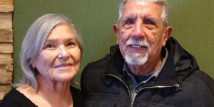 Mary and Rene Romero both work at the Kane County Clerk’s Satellite Office in downtown Aurora. (Tom Strong / For The Beacon-News) 