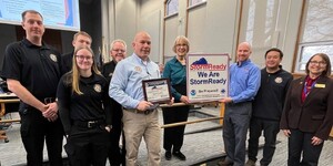 Members of the Kane County Office of Emergency Management, National Weather Service, Kane County Board Chairman Corinne Pierog, and County Board member Mavis Bates