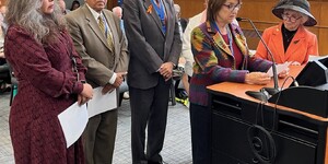 The proclamation was presented by a group of board members, including Mavis Bates, Deb Allan, Myrna Molina, Mo Iqbal, Ted Penesis, and Cherryl Fritz Strathmann.