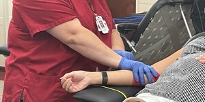 Individual Donating Blood at the Kane County Government Center 