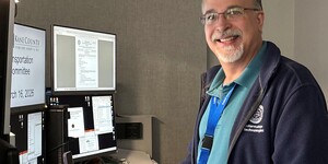 Blair Peters at the IT desk at Kane County