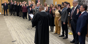 Kane County Board members take the oath of office on December 5. 