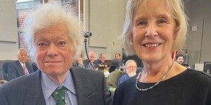 Ken Shepro standing with Kane County Board Chairman Corinne Pierog