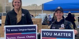 988 Suicide and Crisis Lifeline signs and other material given away during event 