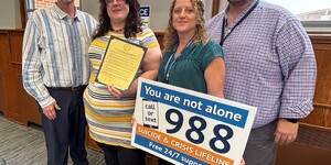 Board Member Bill Tarver, Stephanie Dewinski of Suicide Prevention Services, Tina Koral and Michael Isaacson with the Kane County Health Department 